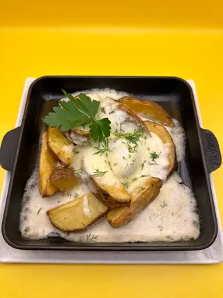 Печена карт під сирним соусом (250г)
