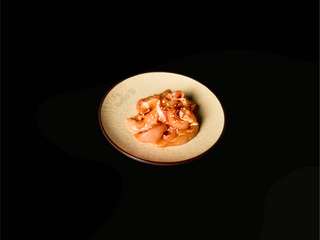 Muslo de pollo marinado (170 g.)