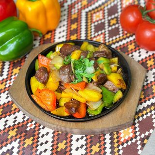 Баранина с овощами на жаровне