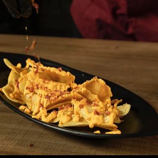 Patata chips cheddar e bacon