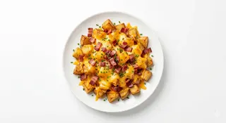 Patatas Con Bacon Y Cheddar