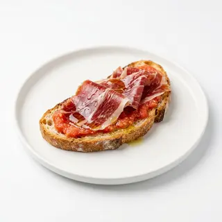 Tosta de Jamón ibérico con tumaca y aceite oliva