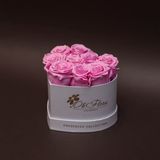 9 trandafiri criogenați roz în inimă albă