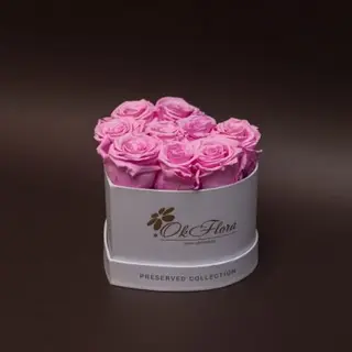 9 trandafiri criogenați roz în inimă albă