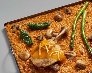 Bomba confit de pato a la naranja