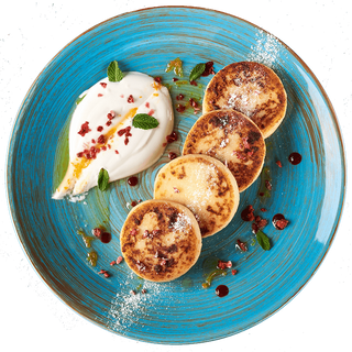 Сирники з ягідним соусом та сметаною (230 г)