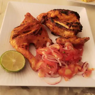 Half Grilled Chicken(1/2 kuku choma) with Chips, Kachumbari and Spinach