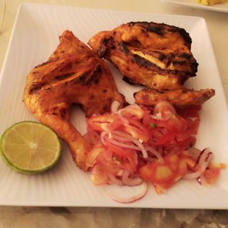 Half Grilled Chicken(1/2 kuku choma) with Chips, Kachumbari and Spinach