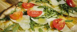 Pizza piatto rucola