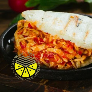 Arepa Con Pollo Guisado