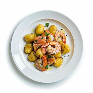 Gnocchi di patate con salmone e gamberi