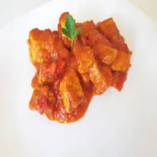 Magro Con Tomates