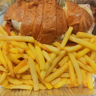 Menú: Croissant pollo especial + papas+bebida