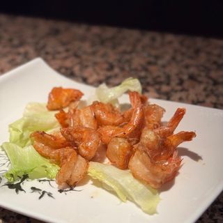 Code di gamberi fritte con pepe