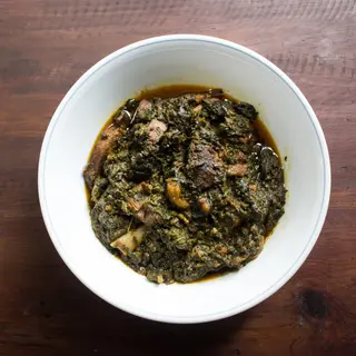 Mutton Palak Com arroz ou naan.