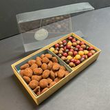 Caja de almendras y bolas crujientes