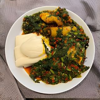 Pounded Yam with Preferred Soup and Offals (assorted)