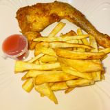 Chicken and chips with ketchup