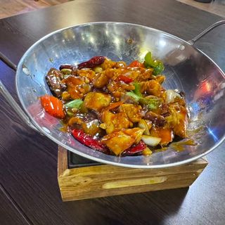 Pollo salteada al wok