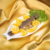 კალმახი ნაკვერჩხალზე