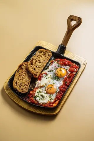 Д.ШАКШУКА 