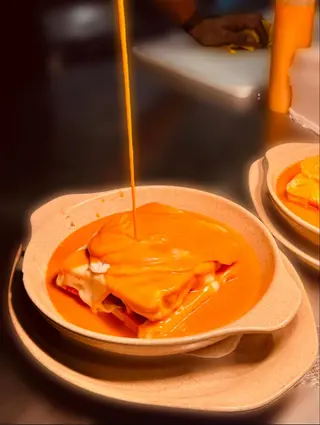Francesinha Boua como o Milho
