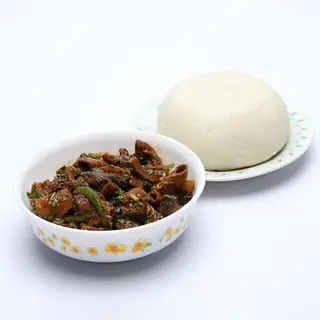 Matumbo with ugali and greens