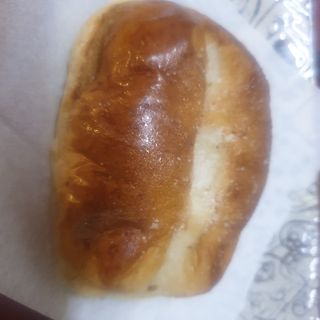 Suizo con mantequilla pavo y queso edam fundido 