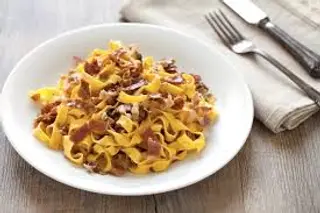 Espaguetis Funghi Prosciutto