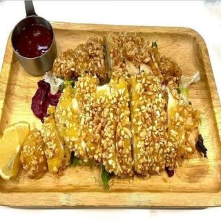 Pollo con almendras crujientes