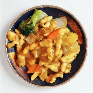 51.  Pollo Al Curry (Ración)