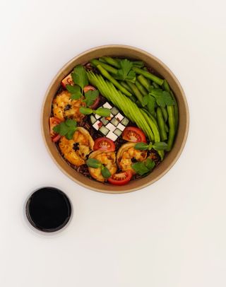 Bowl with king prawns, tofu and cucumber mosaic