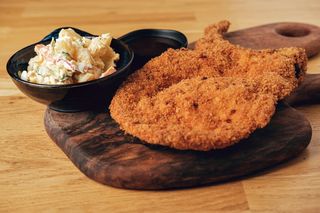 Giant Pork Snitel with Potatoes Salad