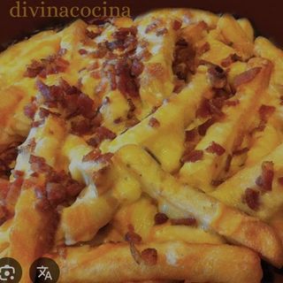 Tapa de patatas gratinadas con carne