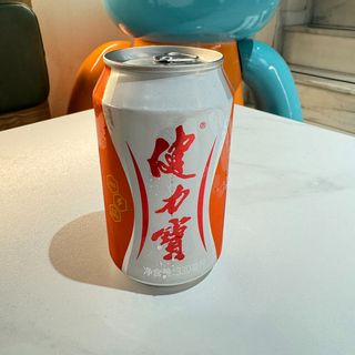 REFRESCO con sabor naranja 健力宝