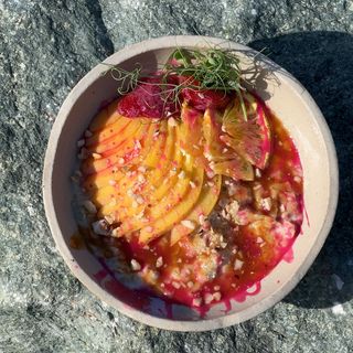 Sweet oatmeal porridge with seasonal fruits