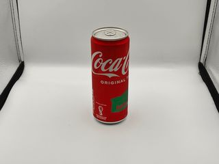 403. Coca-Cola Lattina 330ml