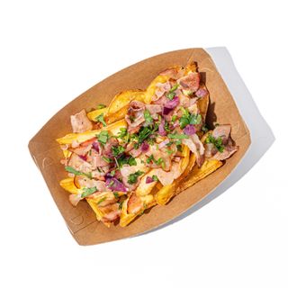 Картопляні діпи з смаженим беконом, плавленним чеддером та цибулею