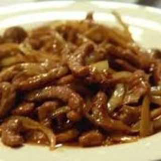 63. Ternera Con Cebolla