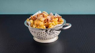 Patate fritte con buccia, cheddar e pulled pork