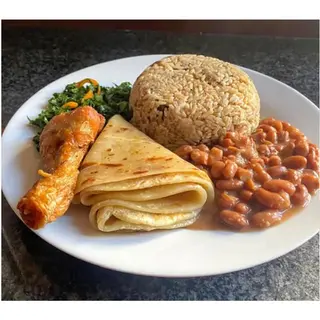 Pilau Rice, Chapati a Piece of Chicken and Beans Sauce
