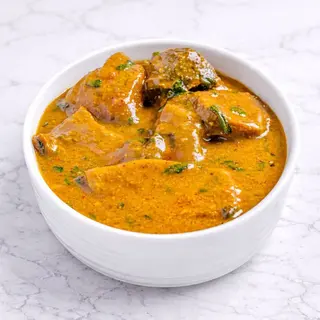 Ogbono Soup with Assorted Goat Meat & Swallow