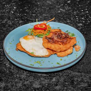 Snitel de porc cu ou si ceapa