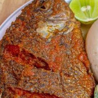 Tilapia fish in Nigerian spicy sauce 