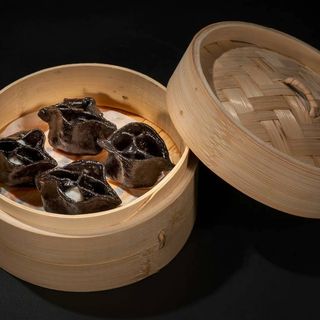 16. Ravioli di calamaro 4 pezzi