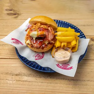 Texas Premium (pan redondo) + papas fritas rolling + salsa brava	