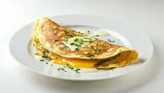 Omletă cu sunca si cașcaval