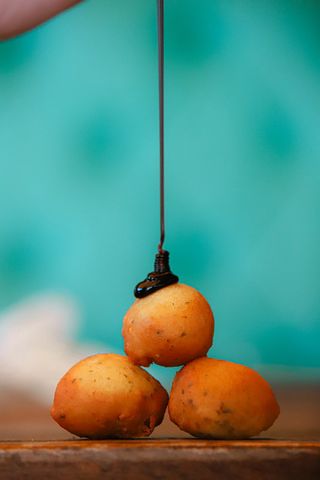 Buñuelos De Bacalao Con Miel De Caña 