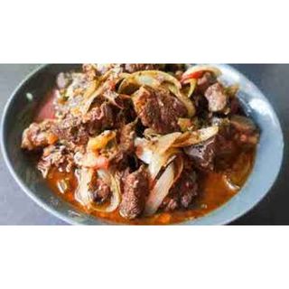 Goat In Sauce / Fried Goat (Tassot)