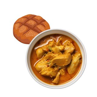 Pollo al curry accompagnato da pane